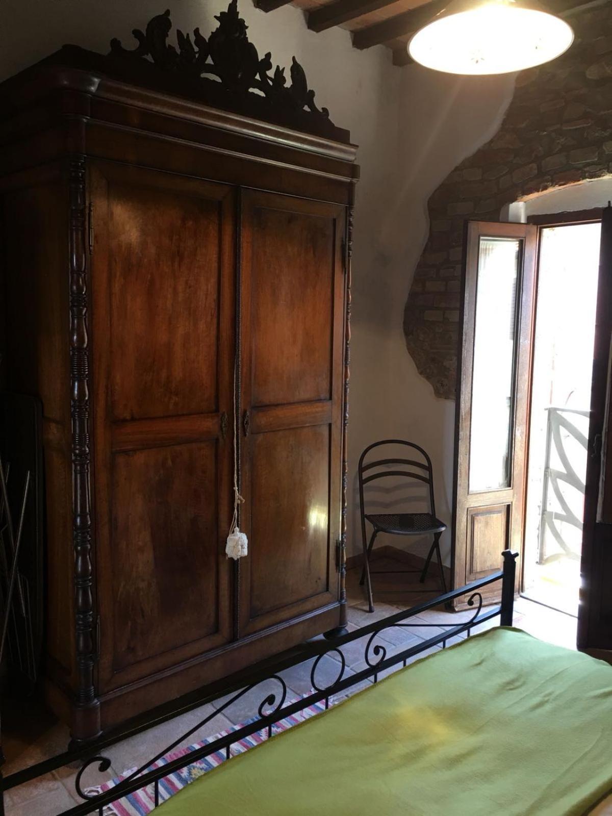 דירות Montepescali La Divina Dimora Il Castello Degli Spiriti Magni מראה חיצוני תמונה