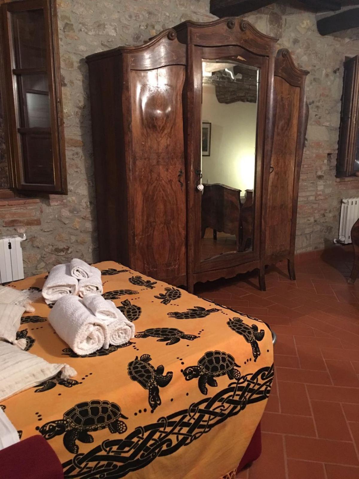 דירות Montepescali La Divina Dimora Il Castello Degli Spiriti Magni מראה חיצוני תמונה